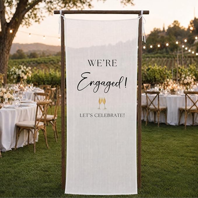 We’re Engaged Banner 73 x 30 Inch, Polyester Engagement Party Hanging Sign by SHESCRZIONU